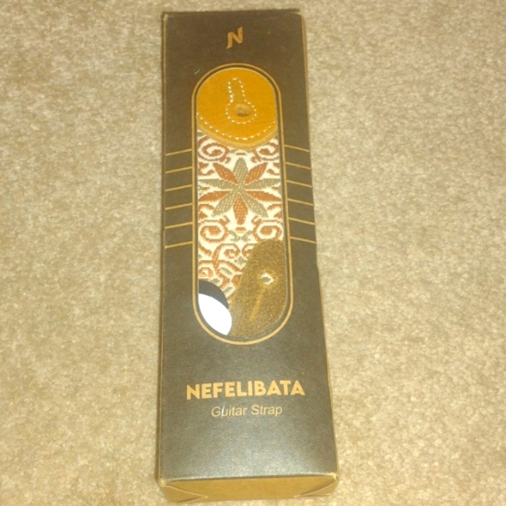 Guitar strap by Nefelibata